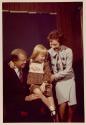 [President and Mrs. Carter and daughter Amy preparing for a Family Portrait]
