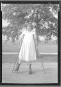 [Woman on Crutches]