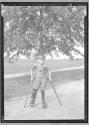 [Boy on Crutches]