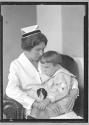 [Child with Nurse]