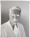 [Man in suit and tie]