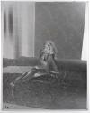 [Woman in lingerie]