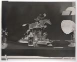 [Whiskey bottle and figurine of a man riding a horse (Hunter)]
