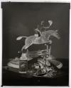 [Whiskey bottle and a figurine of a man riding a horse (Hunter)]