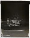 [Whiskey bottle, glass, and two model ships (Hunter)]