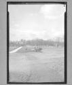 [Several Horse Drawn Wagons in Field]