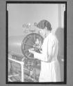 [Woman with Lab Machine]