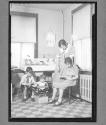 [Woman with Three Children]