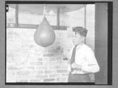 [Boy with Punching Bag]