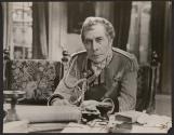 [George Arliss]