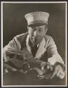 [George Arliss]