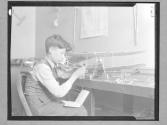 Boy Building Model Airplane