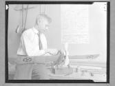 Boy Building Model Airplane