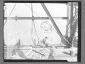 [Workmen on top of Empire State]