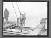 [Workman on Empire State]
