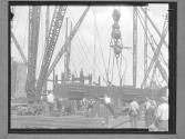 Girder being lifted by Pulley