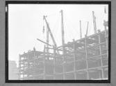 [Lifting a Beam with a Derrick]