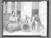 Workers Moving in Large Water Main