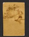 [Man and girl at a pool]