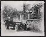 [Nickolas Muray, man, and chauffeur with Bentley automobile at gates of Claude Monet's Giverny Estate]
