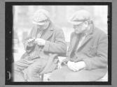 [Two Men on Bench]