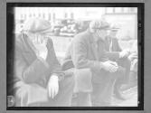 [Men on Bench]