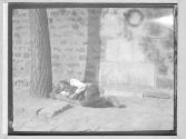 Man Asleep on Road