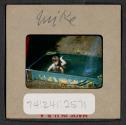 [Mimi Muray playing in a pool (travel slide)]