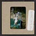 [Mimi Muray playing in a pool (travel slide)]