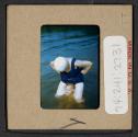 [Mimi Muray and a woman swimming (travel slide)]