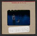 [Peggy and Mimi Muray swimming (travel slide)]