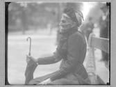 [Old Woman with Umbrella]