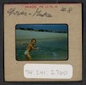 [Nicholas Christopher Muray on a beach (travel slide)]