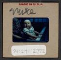 [Mimi Muray playing a piano (travel slide)]