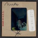 [Mimi Muray in a crib (travel slide)]