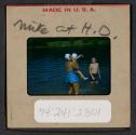 [Mimi Muray swimming with a woman and boy (travel slide)]