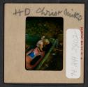[Mimi and Nicholas Christopher Muray playing in a pool (travel slide)]