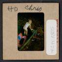 [Mimi and Nicholas Christopher Muray playing in a pool (travel slide)]