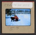 [Mimi Muray and a dog (travel slide)]