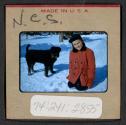 [Mimi Muray and a dog (travel slide)]