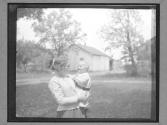 [Woman and Baby]