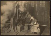 [Shaping rods under trip hammer in steel mill, Pittsburgh]