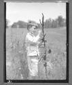 Boy Picking Wildflowers