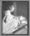 [Child on Cot]