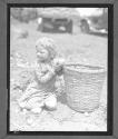 Picking Long Island Potatoes Child Next to Basket