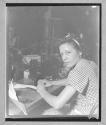 [Woman Sewing]
