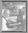 [Older Man Sewing]