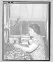 [Woman Sewing]