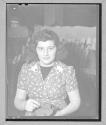 [Woman Holding Fabric]