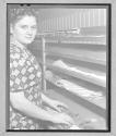 [Woman with Finished Garments]